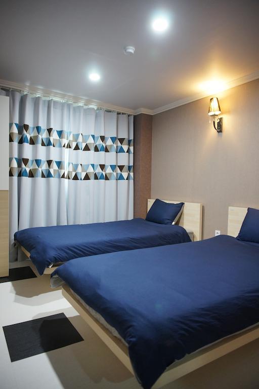 Sumi Guesthouse Haeundae Пусан Стая снимка